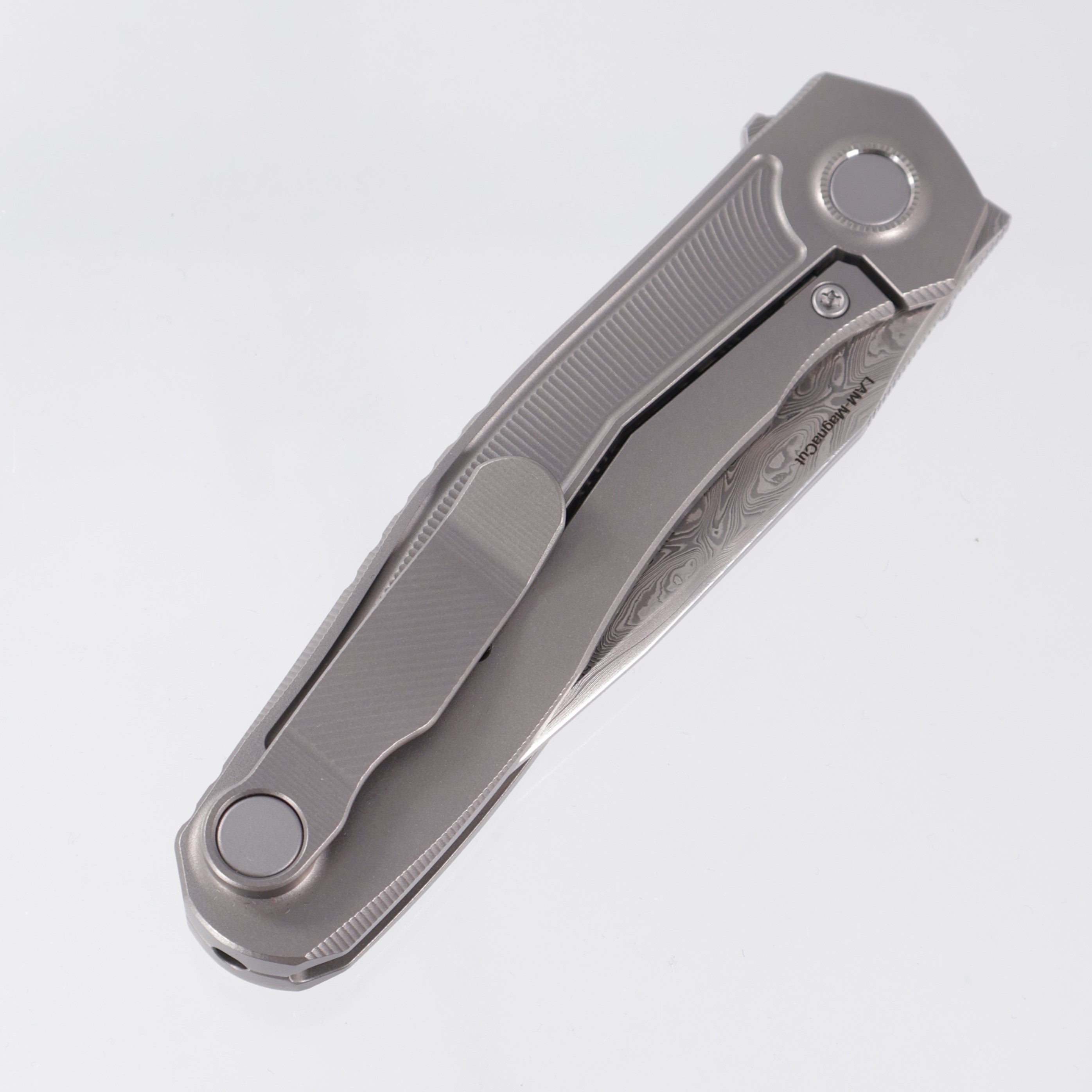 Uldanov Knives R2 Semi-Integral - Radial Milled Titanium w/ Integrated Backstrap - Laminated Magnacut Core Damascus