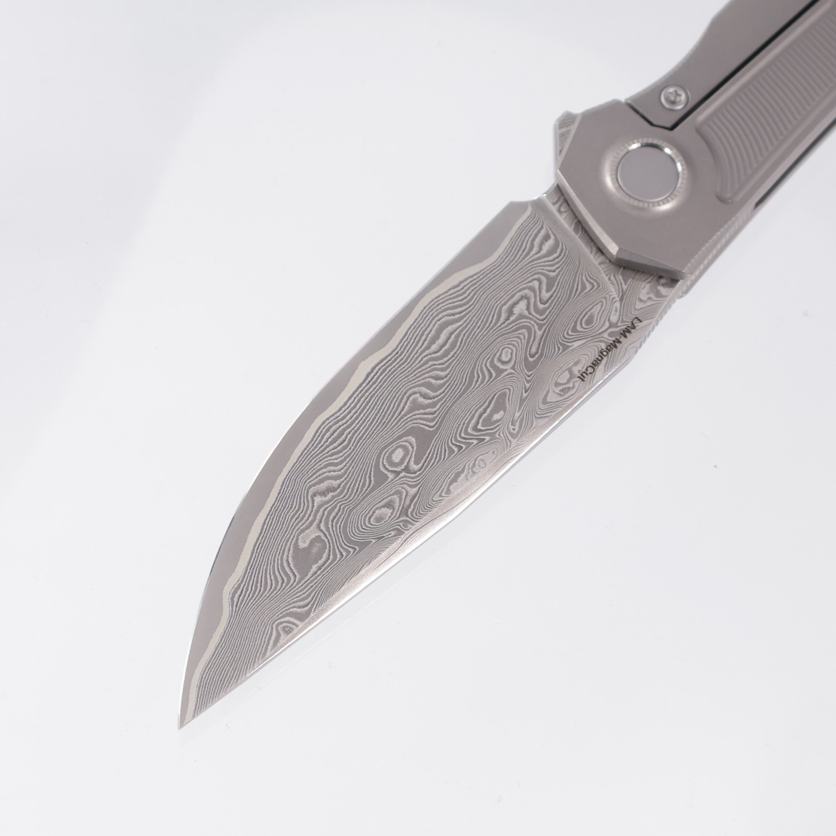 Uldanov Knives R2 Semi-Integral - Radial Milled Titanium w/ Integrated Backstrap - Laminated Magnacut Core Damascus