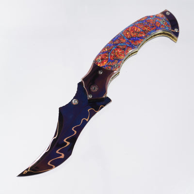Brandon Vallotton Harbinger - Diachrolam Red Burl w/ Baker Forge Dam-Core Chevron Bolsters - Baker Forge Dam-Core Chevron Damascus